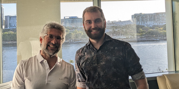 Daniel Quevedo and Manuel Klädtke with Brisbane River in the background