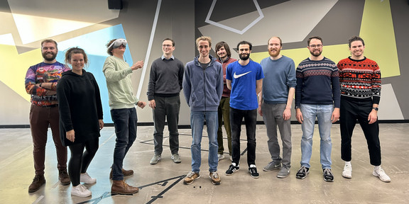 Picture of the team inside the VR areana