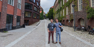 Manuel and Nils at KTH with ECC banner in the background