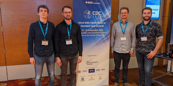 Philipp Binfet, Dieter Teichrib, Nils Schlüter, and Manuel Klädtke at Marina Bay Sands Conference Centre in Singapore, attending 62nd CDC 2023.